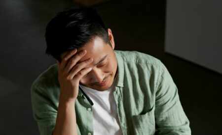 Customer frustrated while using a digital product at his desk
